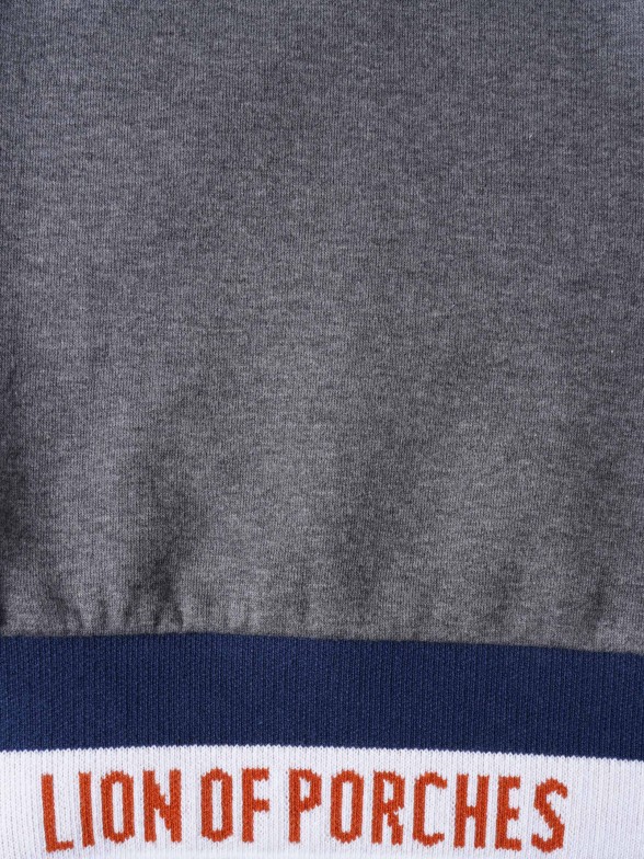 Camisola com fecho e detalhe de riscas
