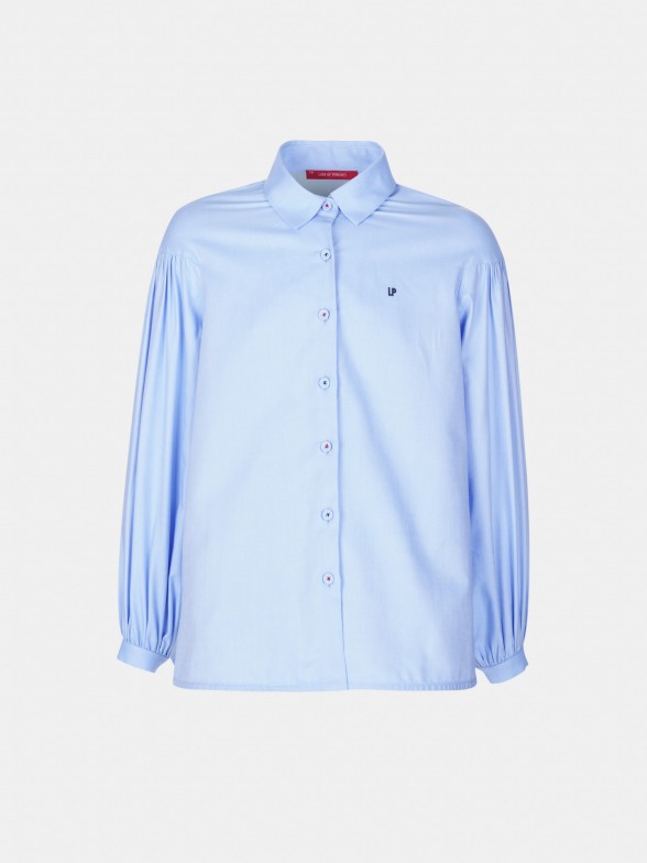 Camisa assimtrica manga abalonada