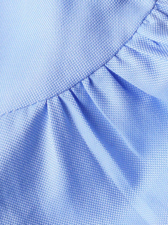 Camisa assimtrica manga abalonada