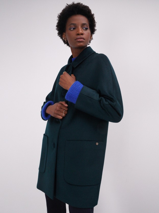 Woman's wool cardigan with pockets and a straight cut