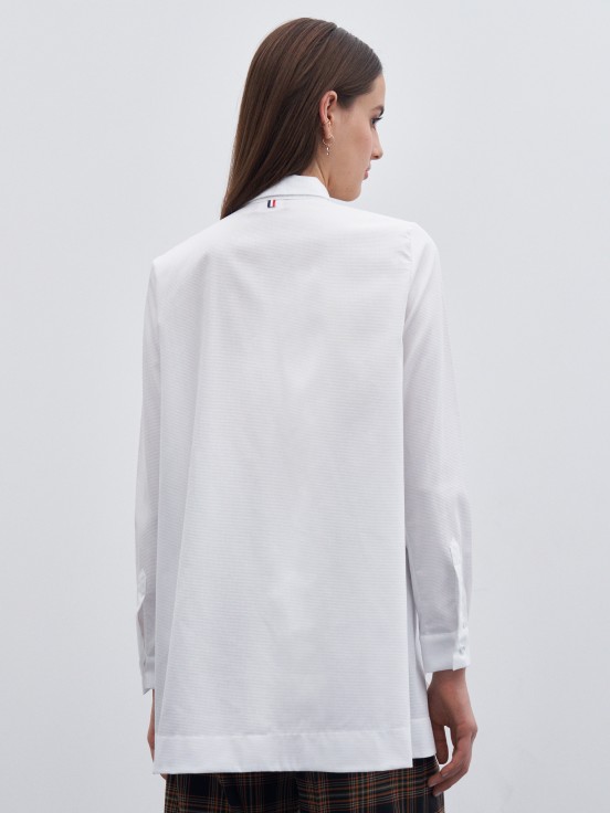 Asymmetric shirt with button detail