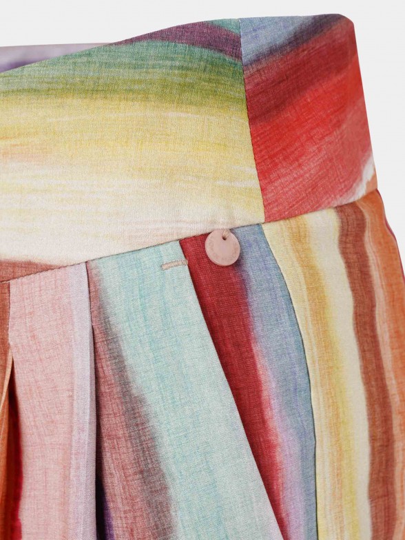 Calças para mulher fluídas com padrão de riscas colorido
