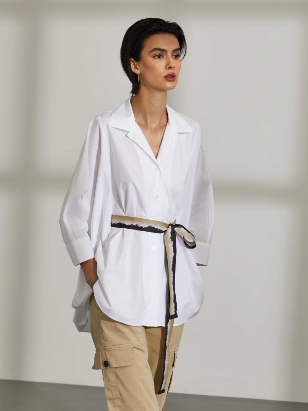 Woman's oversized asymmetrical shirt with belt