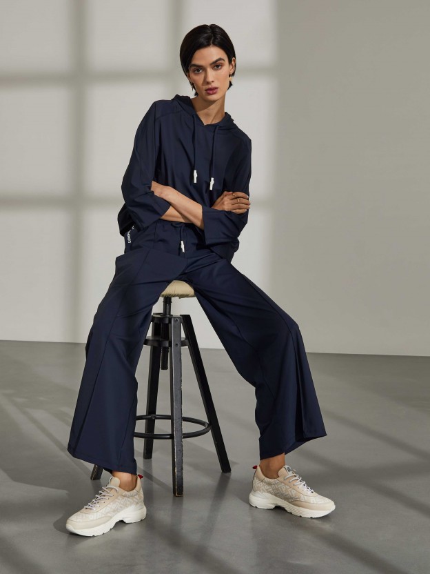 Trousers in knit with wide cut and drawstring