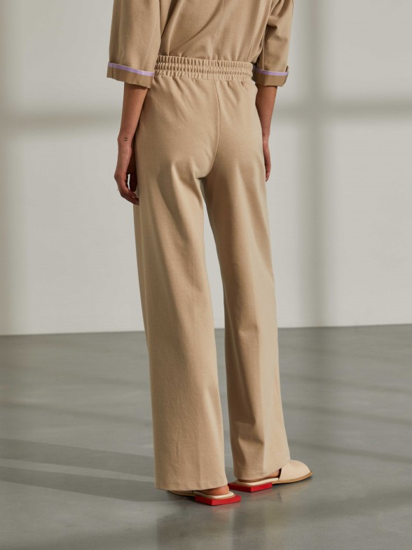 Woman's trousers in knit with wide cut and drawstring