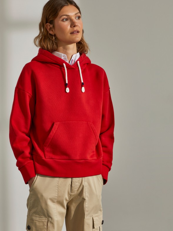 Woman's red sweatshirt with hood