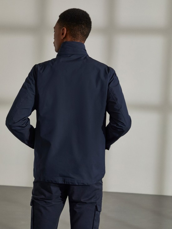 Man's jacket in technical fabric with hood and pockets