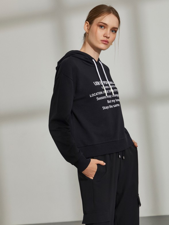 Woman's cotton hooded sweatshirt with printed message