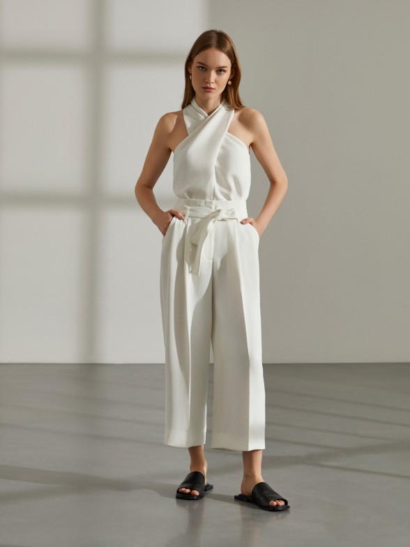 Woman's baggy paper bag trousers with belt