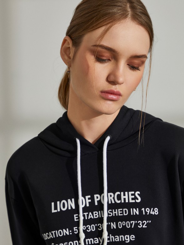 Woman's cotton hooded sweatshirt with printed message