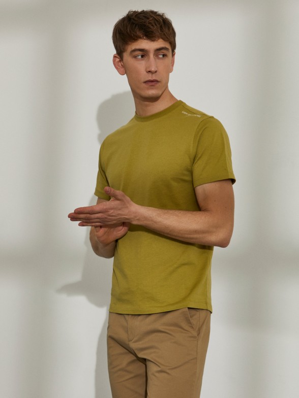 Man's cotton t-shirt with round collar and printed on the back