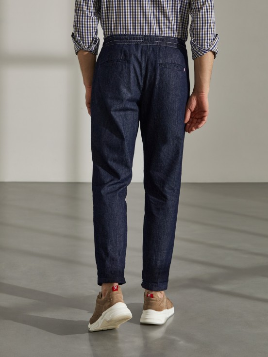 Man's denim regular fit trousers with drawstring