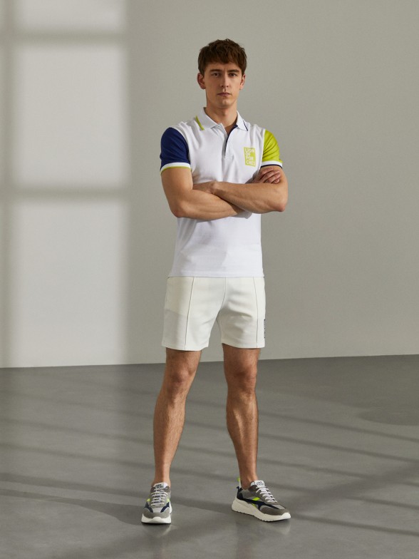 Man's tricolour polo shirt with logo on the chest