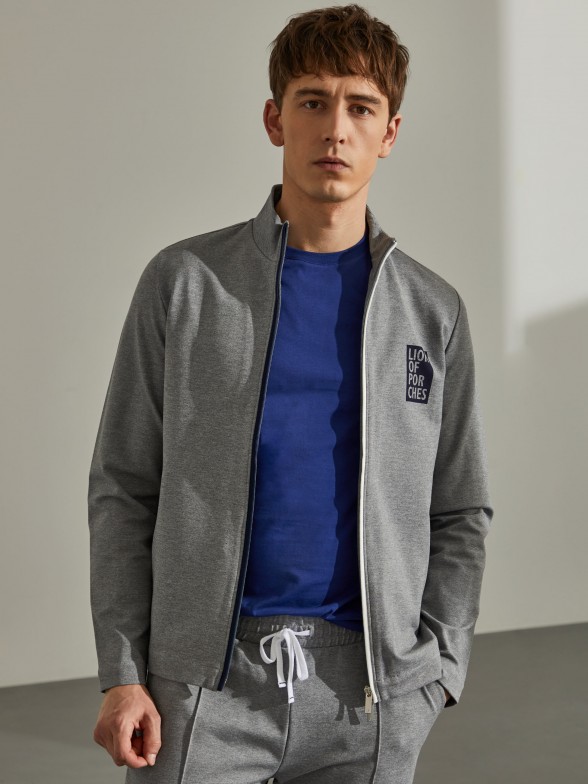Man's jacket with front zip, pockets and print