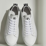 White sneakers with black details