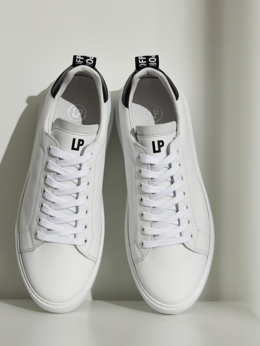 White sneakers with black details