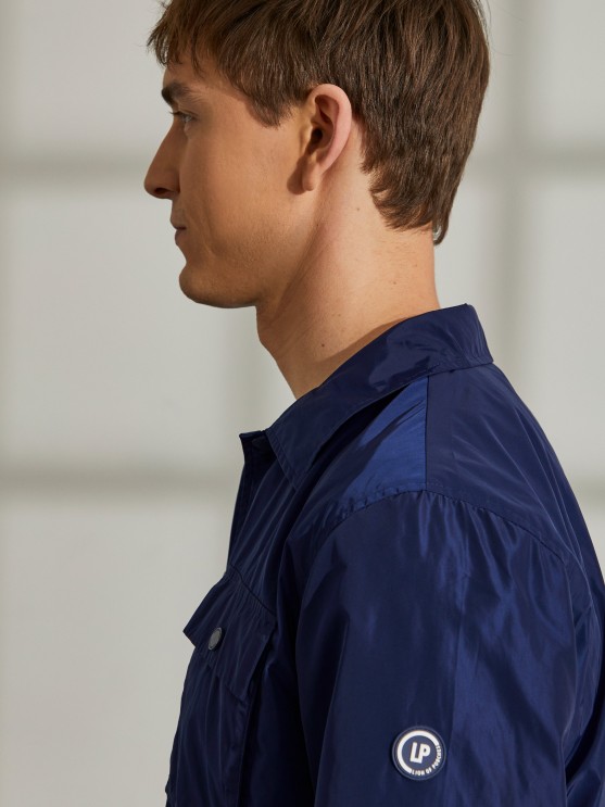 Technical fabric jacket with pockets