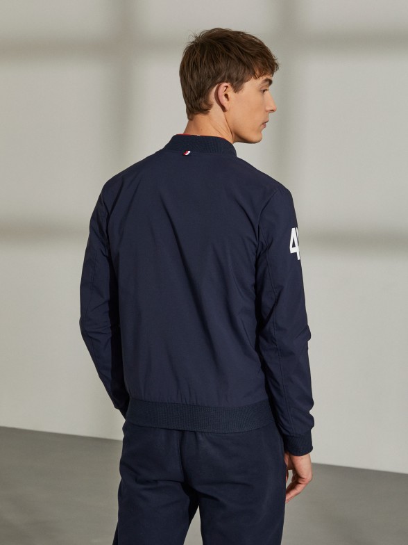 Man's bomber jacket in technical fabric with pockets