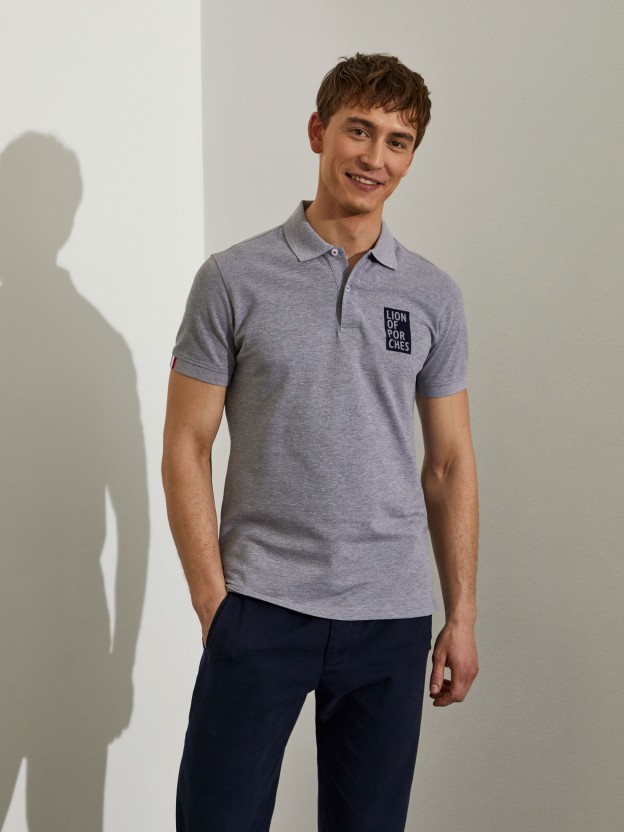 Man's slim fit cotton polo shirt with contrasting logo