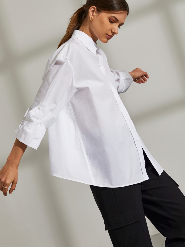 Woman's long asymmetrical cotton shirt