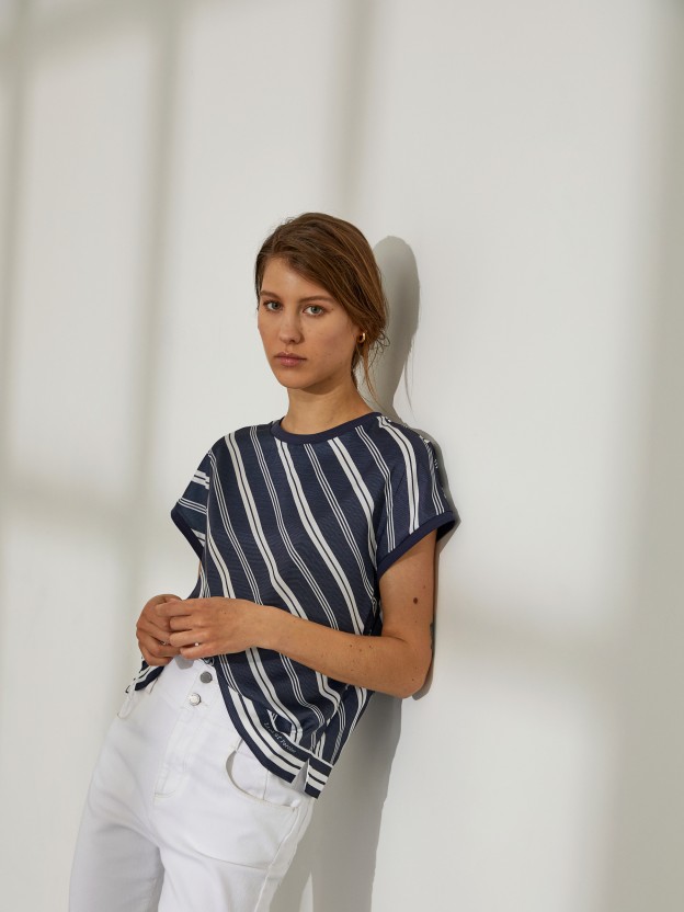 Woman's blouse with stripe pattern and round collar