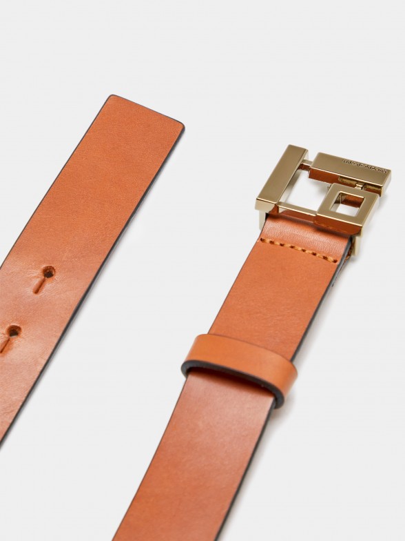 Belt with monogram buckle