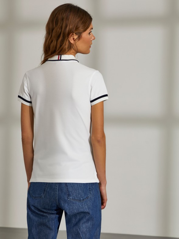 Woman's cotton stretch polo shirt with contrast piping and stripe