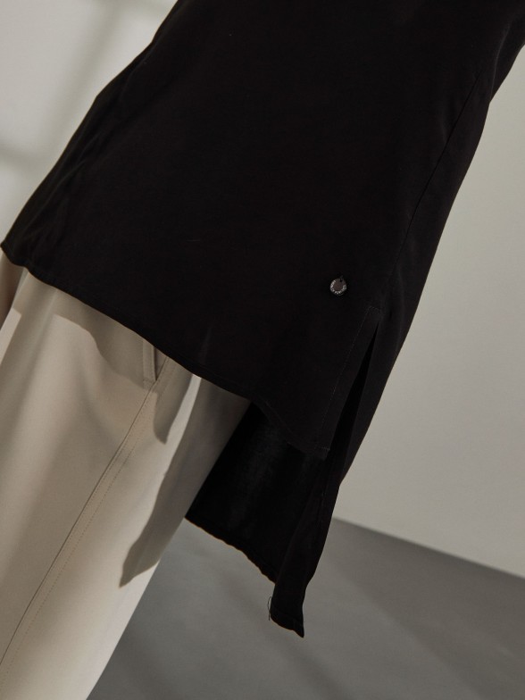 Woman's black asymmetric tunic with v-neck