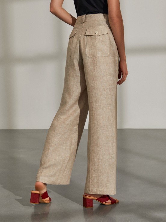 Woman's trousers in linen with pockets and high waist