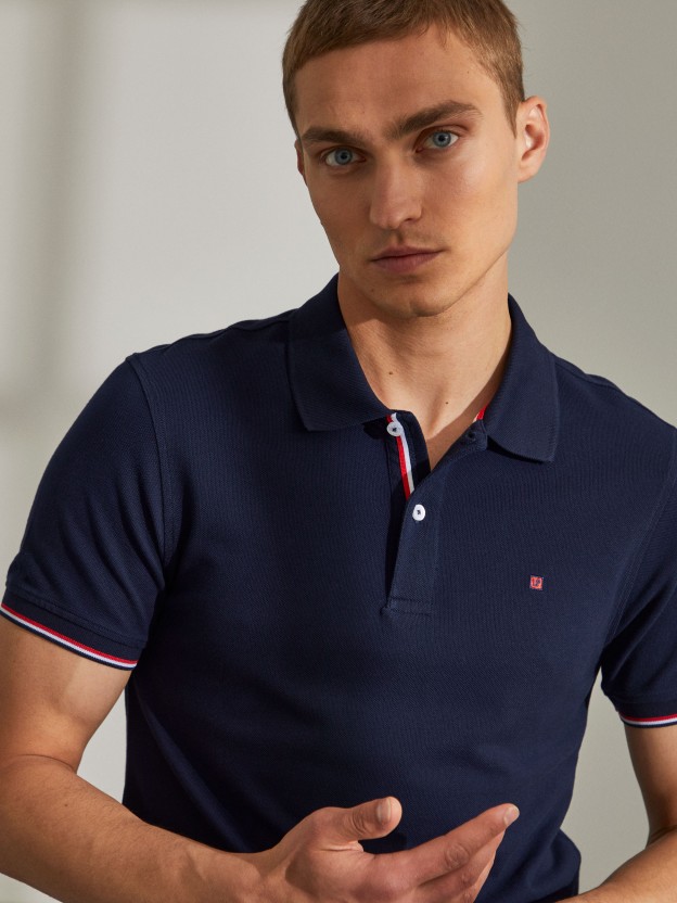 Man's slim fit man's polo shirt with logo on the chest