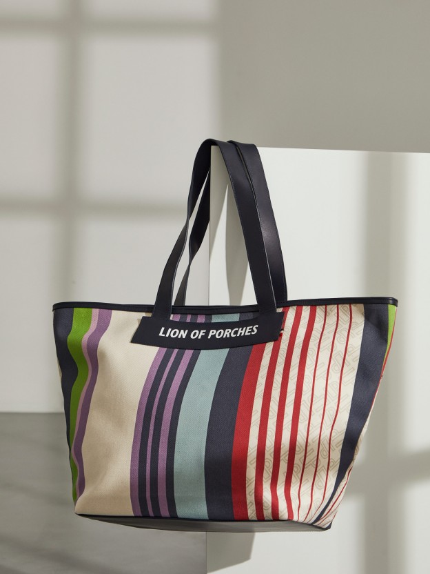 Woman's cotton and leather bag with colourful stripe pattern 