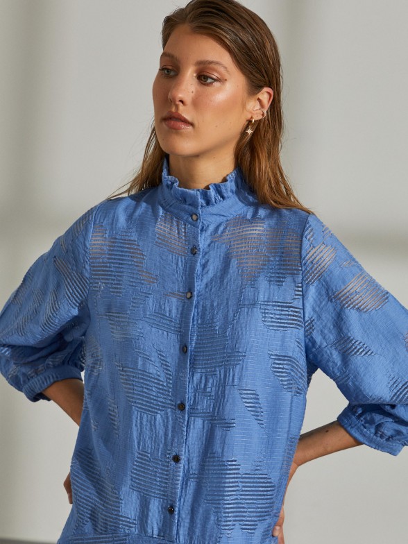 Structured asymmetrical dress with flower pattern