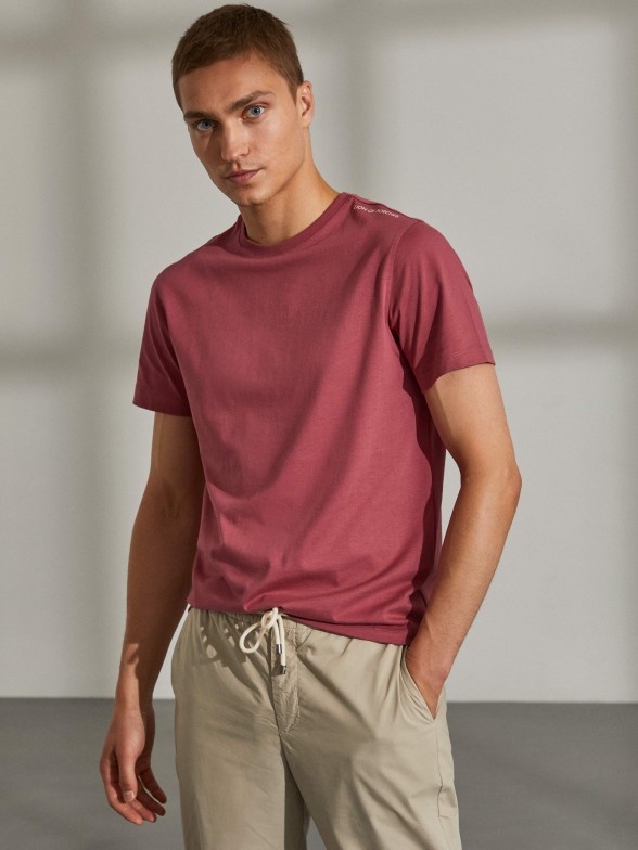 Man's cotton t-shirt with round collar and printed on the back