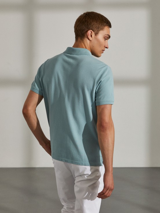 Man's regular fit polo shirt made of cotton with embroidery