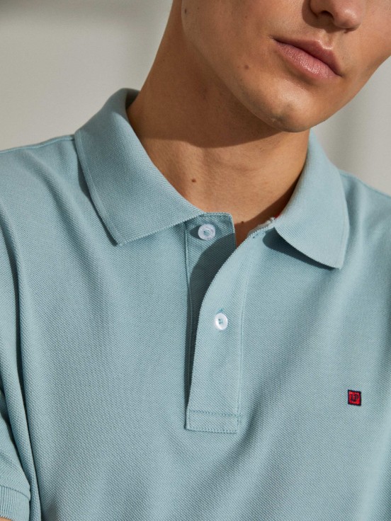 Man's regular fit polo shirt made of cotton with embroidery