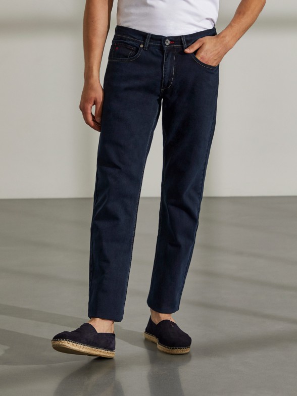 Man's regular fit denim trousers with five pockets