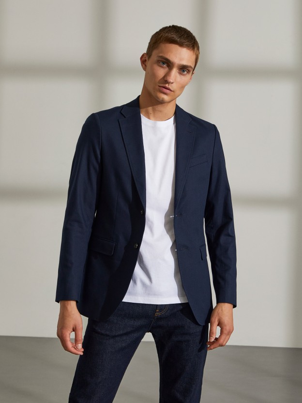 Man's blue slim fit cotton blazer with pockets