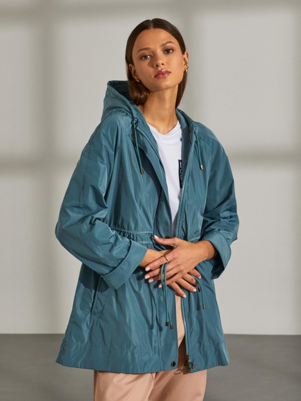 Woman's jacket in technical fabric with hood and adjustable waist
