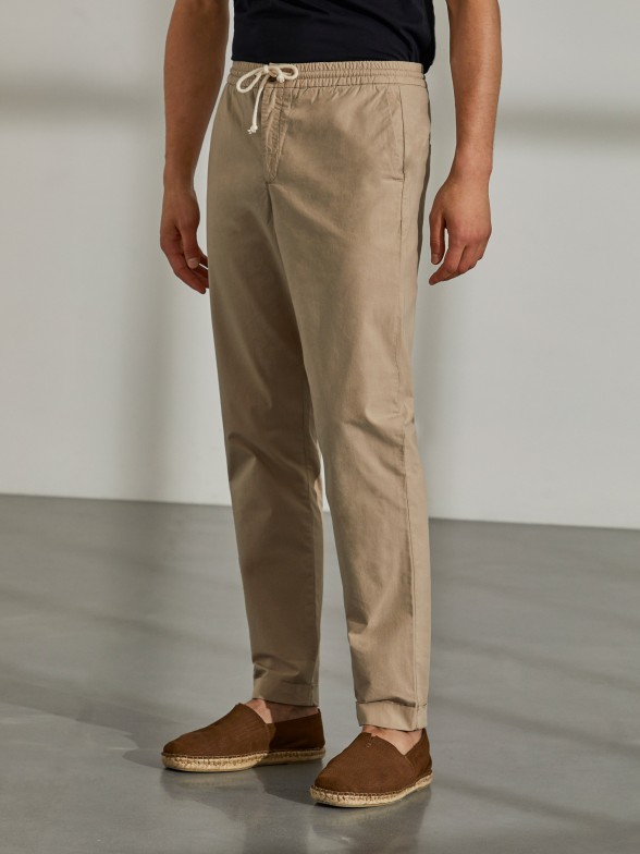Man's regular fit cotton trousers with drawstring
