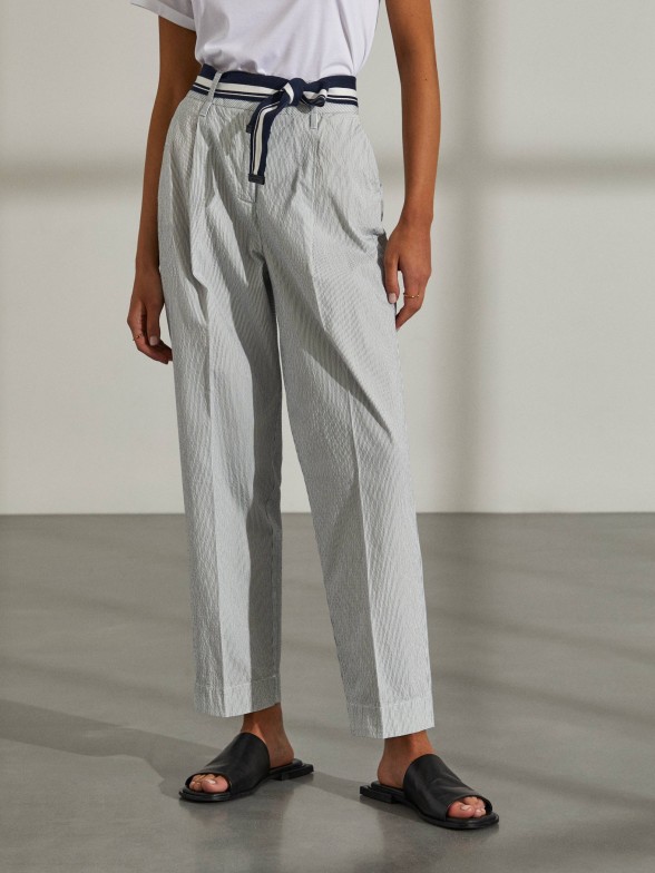 Woman's chinos with stripes and belt