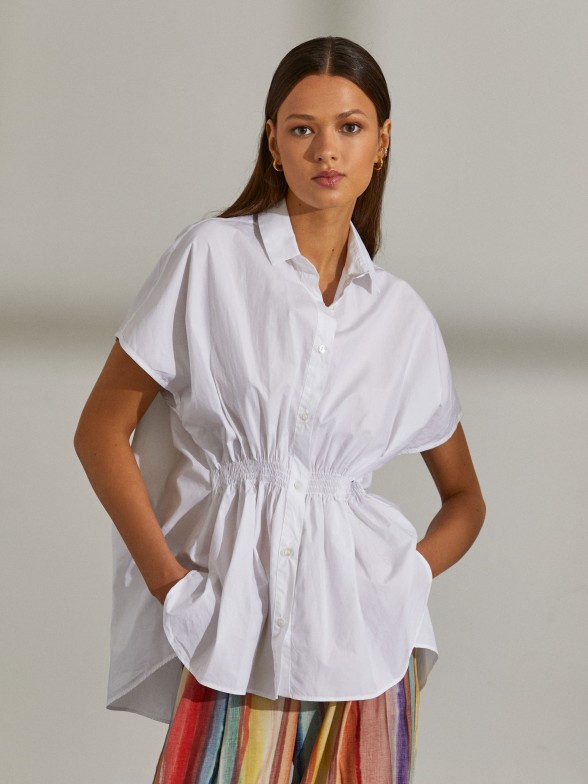 Woman's cotton shirt with short sleeves and elasticated waist