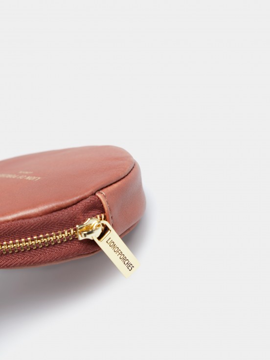 100% leather circular purse