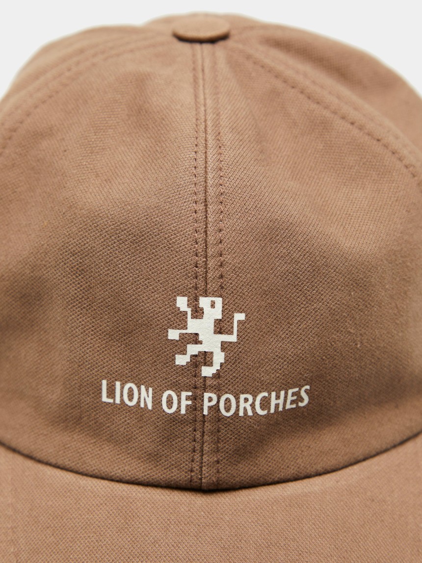 Curved peak cap