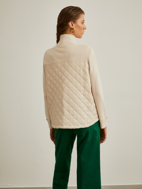 Knitted jacket with quilting