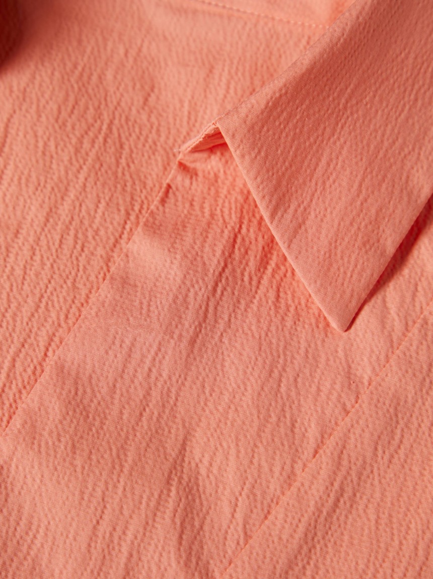 Shirt with flared sleeves