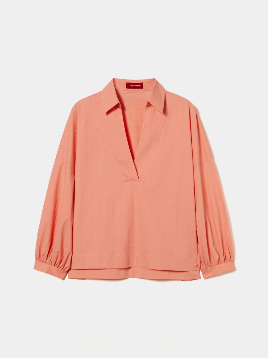 Shirt with flared sleeves
