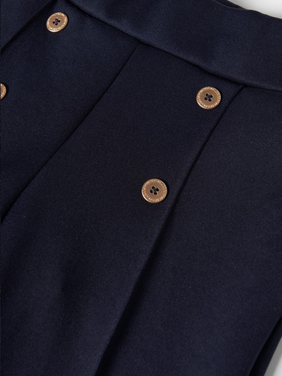 Knitted trousers with buttons