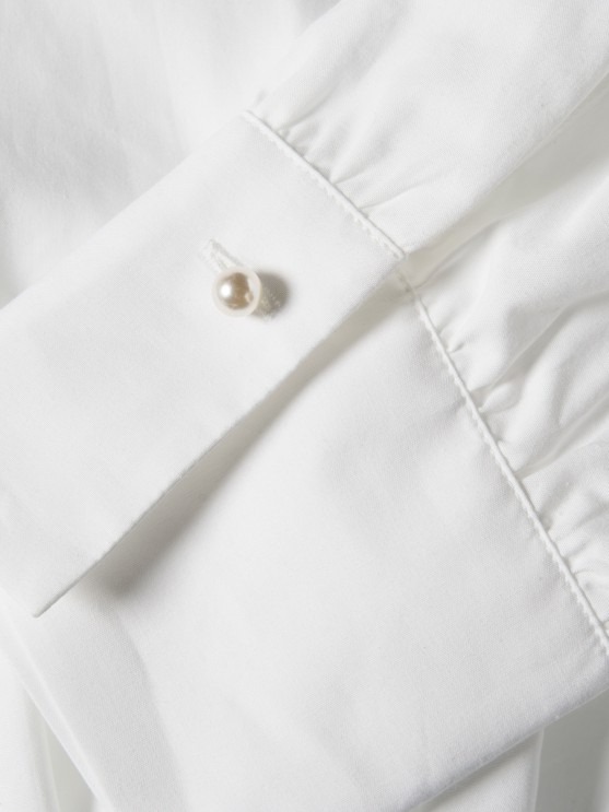Shirt with pleats at the waist
