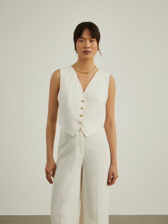 Linen vest with gold buttons