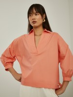 Shirt with flared sleeves